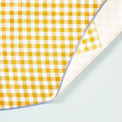 70" Gingham Wipeable Oil-Cloth Round Tablecloth Gold/Cream - Hearth & Hand™ With Magnolia 4 70" Gingham Wipeable Oil-Cloth Round Tablecloth Gold/Cream - Hearth & Hand™ With Magnolia - Image 2